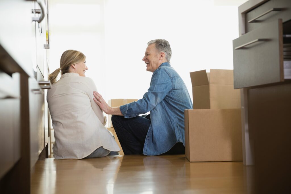 A couple with moving boxes